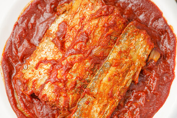 Korean style braised hairtail on a simple background