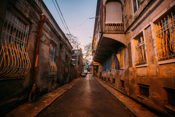 Old shabby houses in the slum district at Tbilisi at night