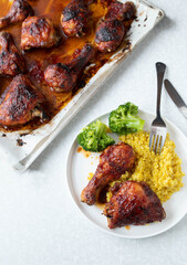 Glazed chicken with pilau rice and broccoli