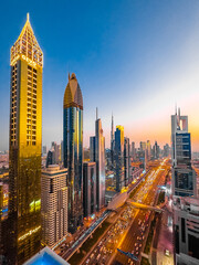 View of Sheikh Zayed Road at sunset in Dubai Downtown Financial center, UAE