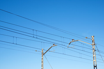 Close-up of the catenary of a railroad track