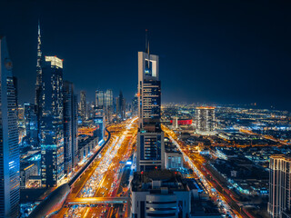 Fototapeta na wymiar View of Sheikh Zayed Road at sunset in Dubai Downtown Financial center, UAE