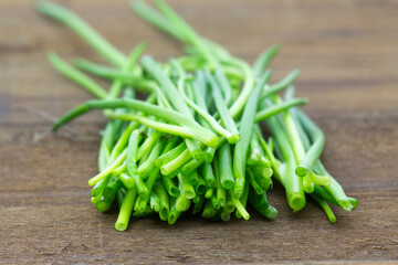 fresh chive on wooden background