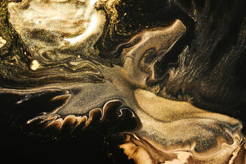 Luxury abstract background, liquid art. Black gold paint mix, alcohol ink blots, marble texture....