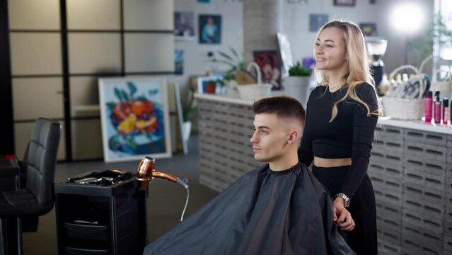 Attractive young man is a regular customer of a premium beauty salon
