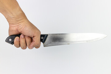 Hand holding a knife on a white background, closeup of photo