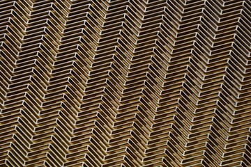 silver aluminum grille at the factory, background