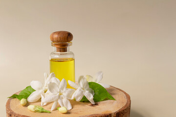 White mogra or arabian jasmine or Jasminum sambac flower Buds Essential oil in glass bottle