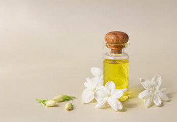 White mogra or arabian jasmine or Jasminum sambac flower Buds Essential oil in glass bottle