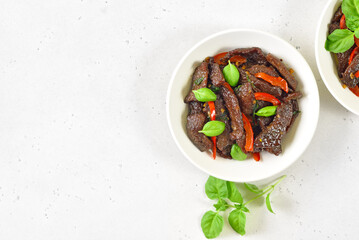 Thai beef stir-fry with pepper and basil