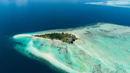 Tropical island Sibuan with sandy beach and coral reef. Tun Sakaran Marine Park. Borneo, Sabah,...