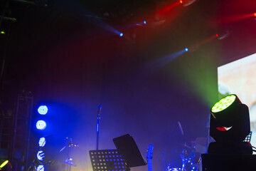 Performance scene background photo with colorful spot lights
