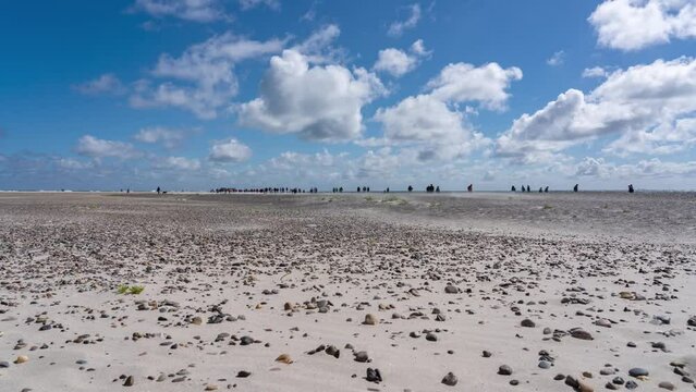 Time lapse footage of people walking in the Grenen sandbar on the Skagen Odde peninsula, Denmark