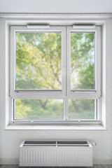 plastic window with closed cordless shades shutter in apartment