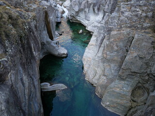 The crystalline and emerald waters in the canyons of the Verzasca river. Lavertezzo, Switzerland.