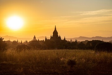 Fototapeta na wymiar Silhouette of Temples in Bagan, Myanmar, in Front of the Setting Sun.