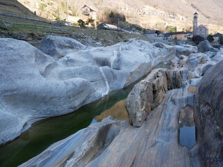 The crystalline and emerald waters in the canyons of the Verzasca river. Lavertezzo, Switzerland.
