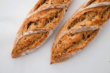 Closeup of rustic bread on a white background