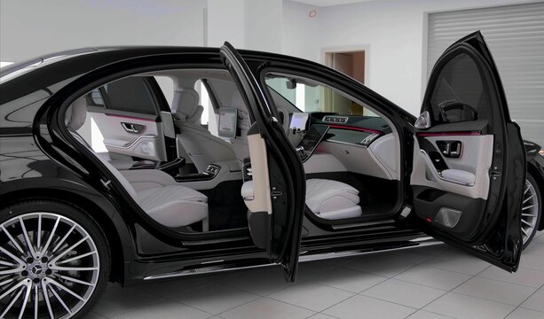 Scenic view of a beautiful black Mercedes Benz S class seen from the side while the doors are open