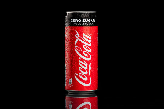Wet aluminum cocal cola zero can isolated on a black background