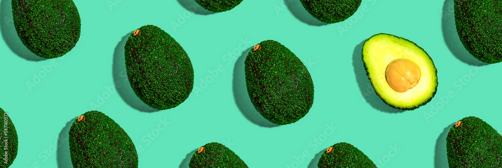 Wall mural Fresh avocado pattern overhead view - flat lay