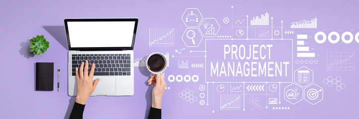 Project management theme with person using a laptop computer