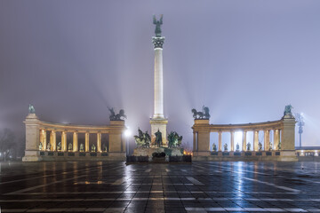 Fototapeta na wymiar Budapest, Hungary illuminated night view of Heroes Square, Hosok Tere, with Millennium Monument and statues of the leaders of 7 tribes who founded the country.
