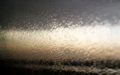 Sunset seen through a car window after a sandstorm outside Tehran, Iran