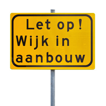 Traffic sign with the Dutch text for "Attention - Residential area under construction"