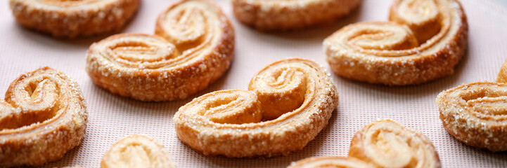 Homemade cottage cheese cookies in sugar glaze in form of heart