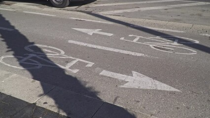Cycling On Bicycle and electric scooter on deducated Lane, Cyclists Using The Designated Bicycle Lane