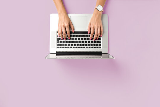 Woman working in modern office. Top view