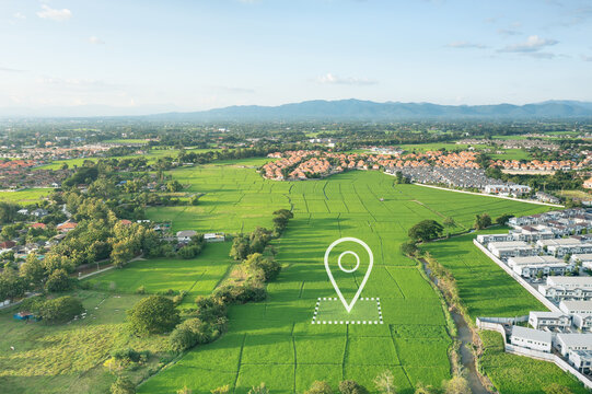Land plot in aerial view. Identify registration symbol of vacant area for map. Real estate or property for business of home, house or residential i.e. construction, development, sale, buy, investment.