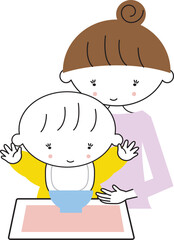 食事の時間の赤ちゃんとママ