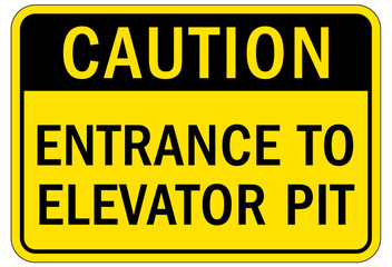 Elevator warning sign and labels entrance to elevator pit