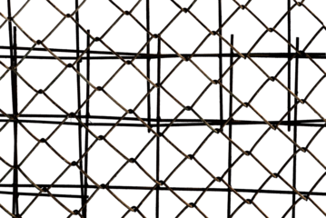 The texture of the metal mesh. Torn, destroyed, broken metal mesh on a white background