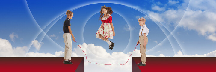 Kids, children playing, jumping over rope, having fun against abstract sky background. Contemporary...