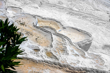 View of dry traventines in Pamukkale on a sunny summer day. View from the top. Turkey
