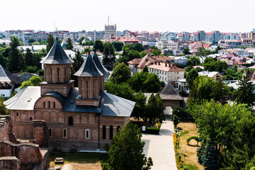 Fototapeta na wymiar Aerial view of the Royal court of Targoviste and the city landscape seen from the Chindia tower. Targoviste, Romania.