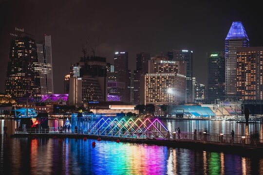 Light Art Installations Near The Skyline Of Singapore At Night