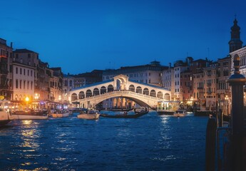Evening view of the Rialto bridge in Venice, Italy