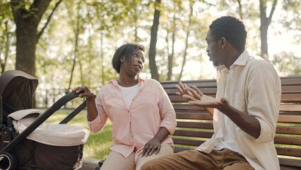 Husband fighting with wife, couple arguing about child upbringing, problem in a relationship