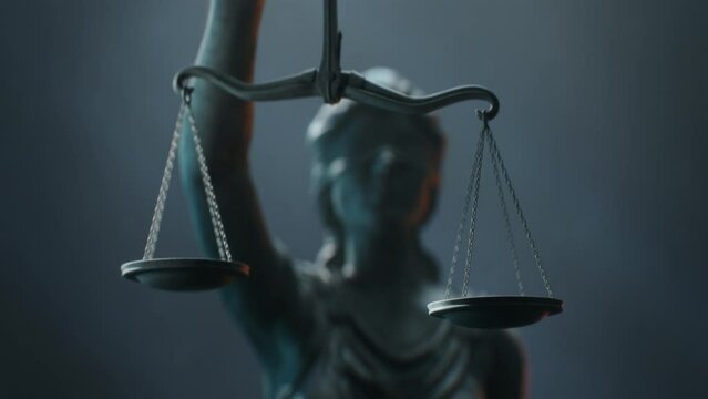 Cinematic and Atmospheric Close-up Shot of Scales that Lady Justice is Holding. The Statue is Blindfolded and Holding Sword.
A Title Sequence for Court Show Mock-up.