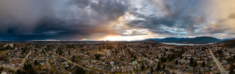 Modern City Suburban Neighborhood. Burnaby, Vancouver, BC, Canada. Aerial Panorama. Winter Sunset