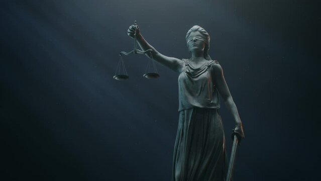 A Title Sequence for Court Show Mock-up. Cinematic and Atmospheric Shot of Lady Justice Sculpture in Dramatic Light. The Statue is Blindfolded and Holding Scales and Sword.