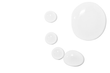 large drops of transparent gel or serum or water, on a white background, top view, isolated