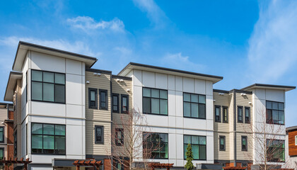 Naklejka premium New residential townhouses. Modern apartment buildings in Canada. Modern complex of apartment buildings