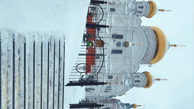 Belogorsky St. Nicholas Orthodox Missionary Monastery. Russia, Perm Krai, Belaya Gora. The temple on the hill in winter. Monastery on the background of snow. 4K