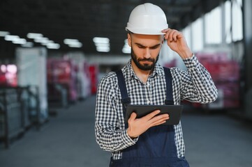 Warehouse worker. Guy in warehouse worker uniform.