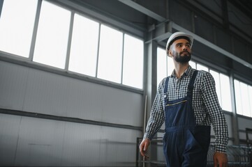 Warehouse worker. Guy in warehouse worker uniform.